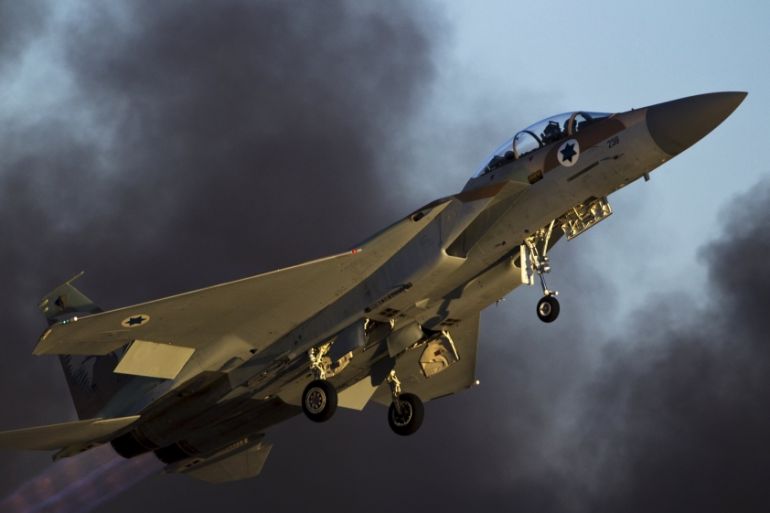 An Israeli air force F-15 fighter jet flies during an exhibition at Hatzerim air base in southern Israel