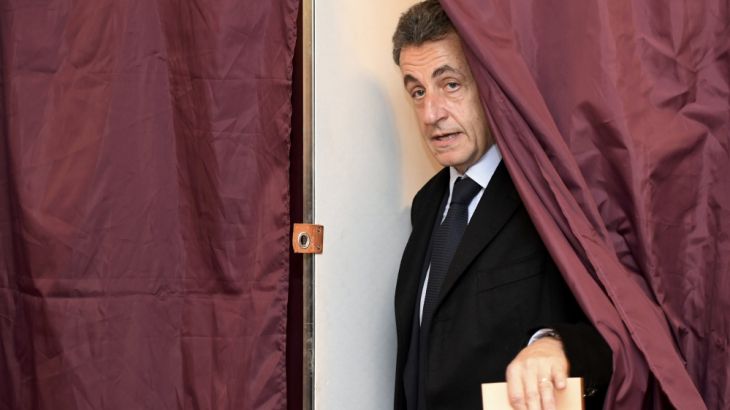 Nicolas Sarkozy, former French president and candidate for the French conservative presidential primary, votes in the first round of the French center-right presidential primary election in Paris