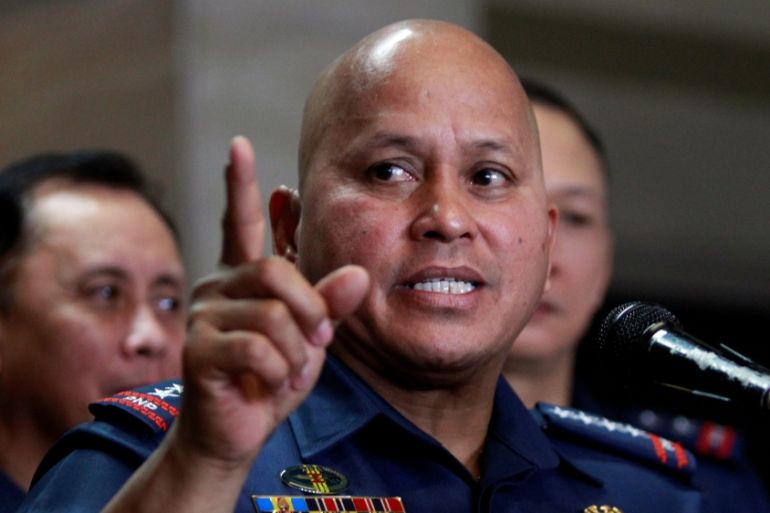 Philippine National Police Director General Ronald Dela Rosa gestures during a news conference at the PNP headquarters in Quezon