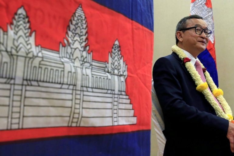 Cambodian opposition leader Sam Rainsy answers questions during an interview with Reuters at a hotel in metro Manila, Philippines