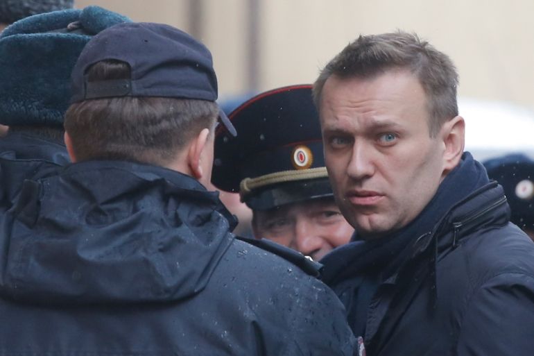 Russian opposition leader Alexei Navalny arrives at Tverskoi court