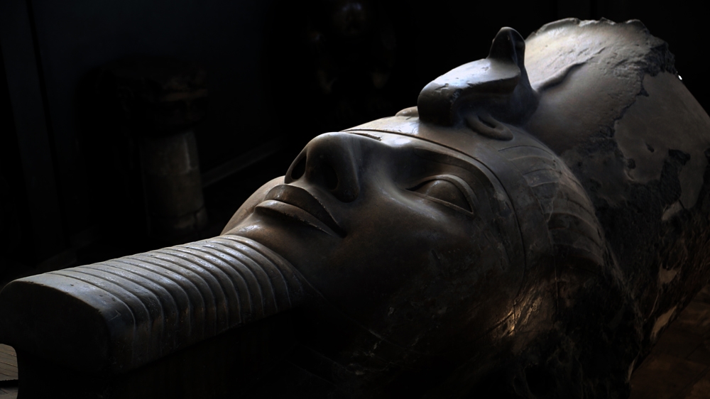 This gigantic, 83-tonne statue of Ramses II was carved in limestone [Dorian Geiger/Al Jazeera]