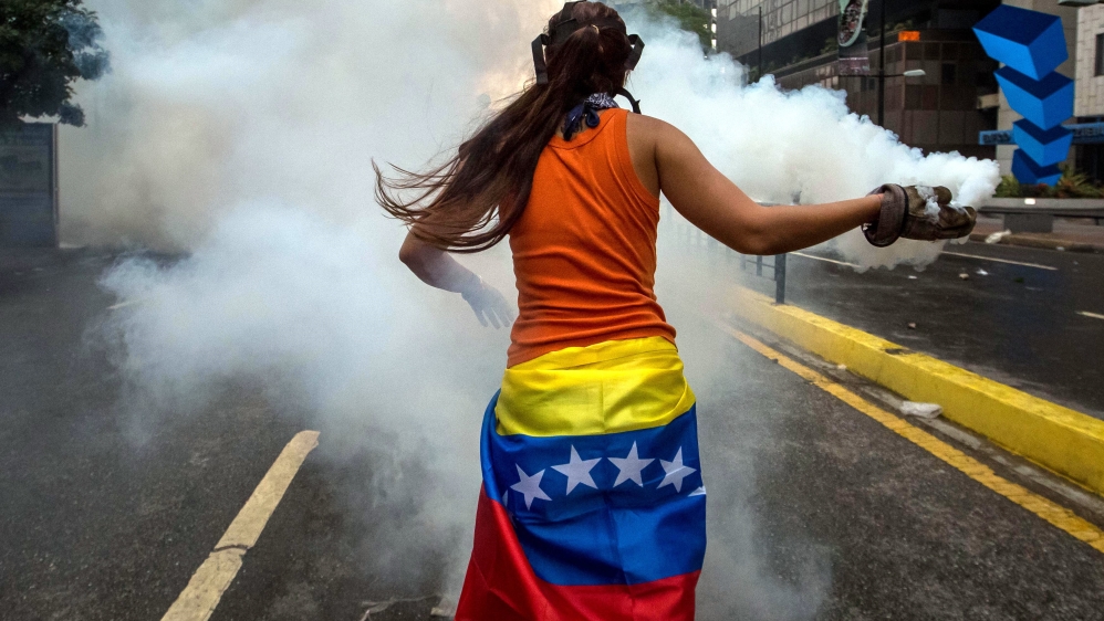 Venezuela has seen a month-long protest amid debilitating economic crisis [Miguel Gutierrez/EPA]