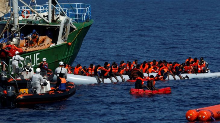 Rescue NGOs Sea-Eye and the Migrant Offshore Aid Station (MOAS) carry out a joint rescue operation