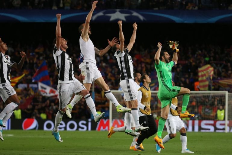 Juventus'' Gianluigi Buffon celebrates with teammates after the match