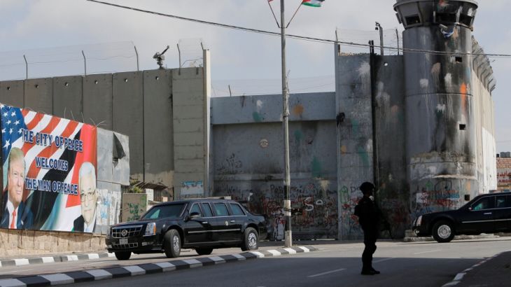 U.S. President Donald Trump''s motorcade crosses through an Israeli checkpoint as he arrives at the West Bank town of Bethlehem