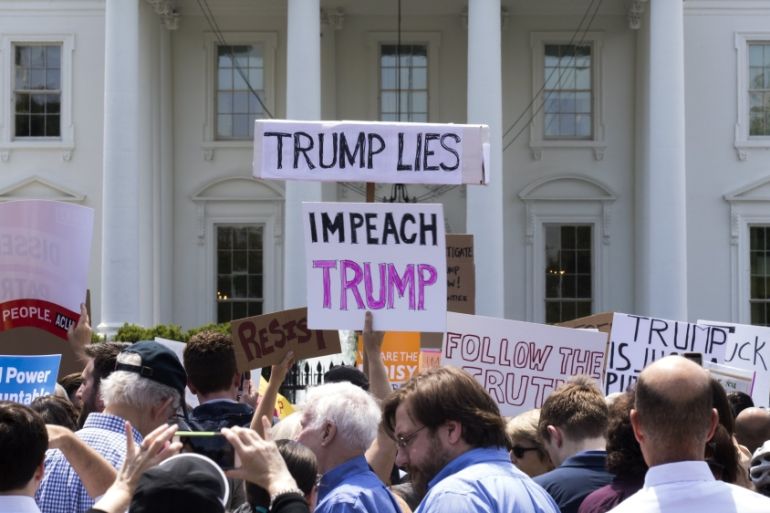 Protesters rally outside the White House in opposition to President Trump''s firing of FBI Director James Comey