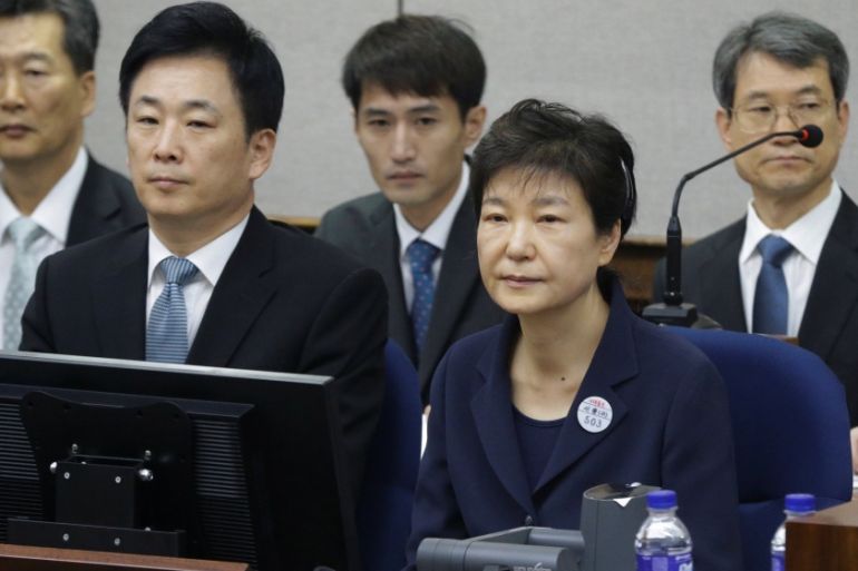Former South Korean President Park Geun-hye sits for her trial at the Seoul Central District Court in Seoul, South Korea
