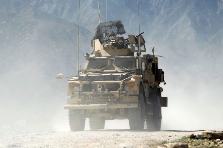 U.S. armoured vehicle patrol in Pandola village near the site of a U.S. bombing in the Achin district of Nangarhar province in eastern Afghanistan A