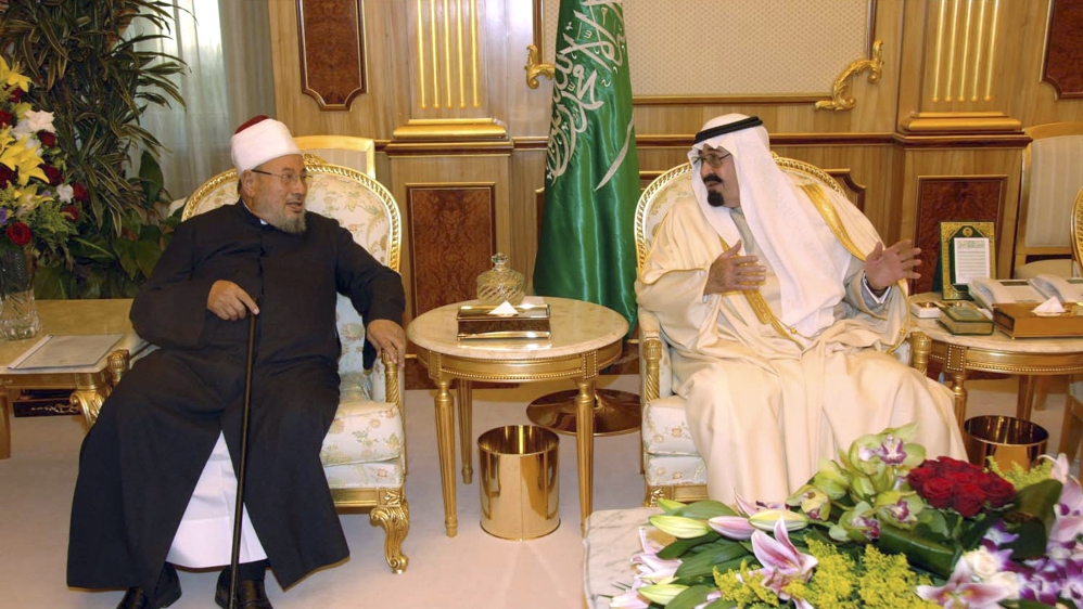 Late Saudi King Abdullah bin Abdul Aziz Al Saud, right, received Yussuf al-Qaradawi, left, in Riyadh in 2009 [Reuters]