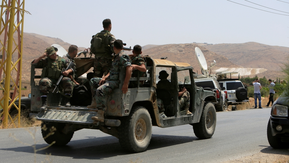 Lebanese army says it is not coordinating military operations with Syrian army [Ali Hashisho/Reuters]