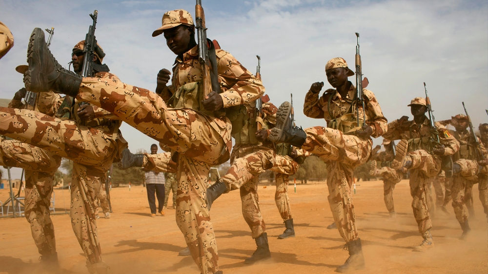 There are at least 12,000 UN peacekeeping troops and 5,000 French troops in Mali [Joe Penney/Reuters]