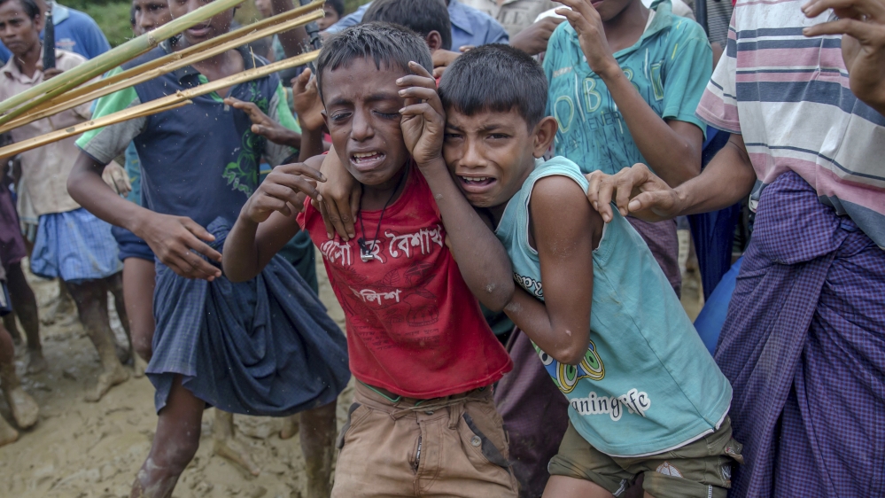 Children make up about 60 percent of the sea of humanity that has poured in to Bangladesh [AP]