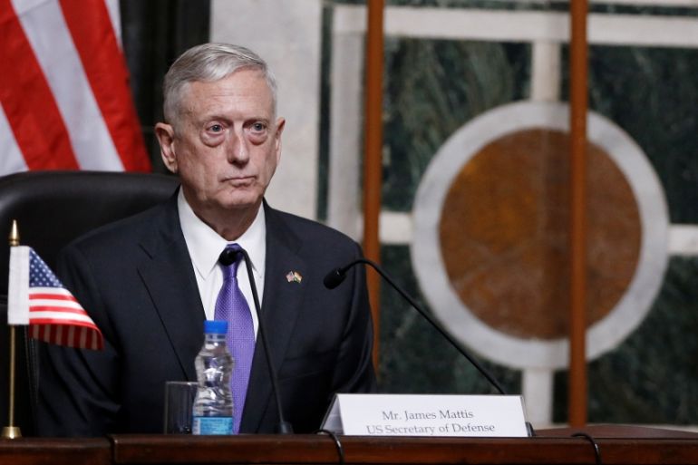 Mattis listens to question during joint news conference in New Delhi