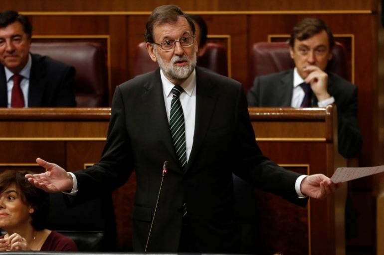 Spanish Prime Minister Mariano Rajoy answers a question at the Parliament in Madrid