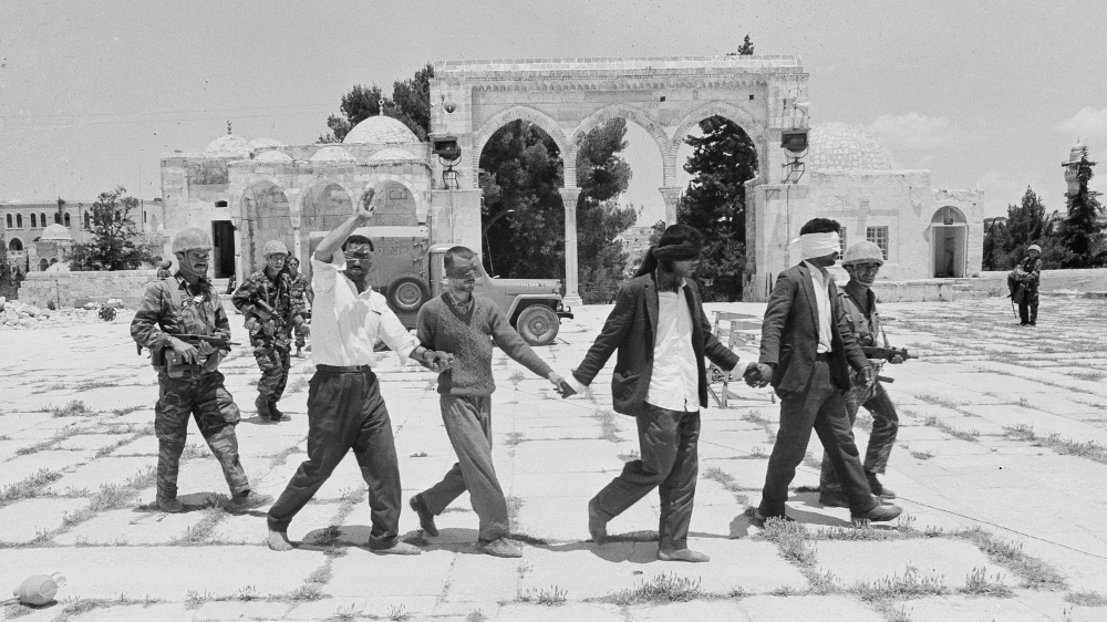 Arab prisoners of war are led blindfolded to interrogation in the old city of Jerusalem on June 8, 1967 [File: AP]