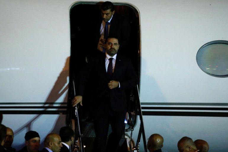 Saad al-Hariri, who announced his resignation as Lebanon''s prime minister from Saudi Arabia, walks down the steps of an airplance at Beirut''s international airport