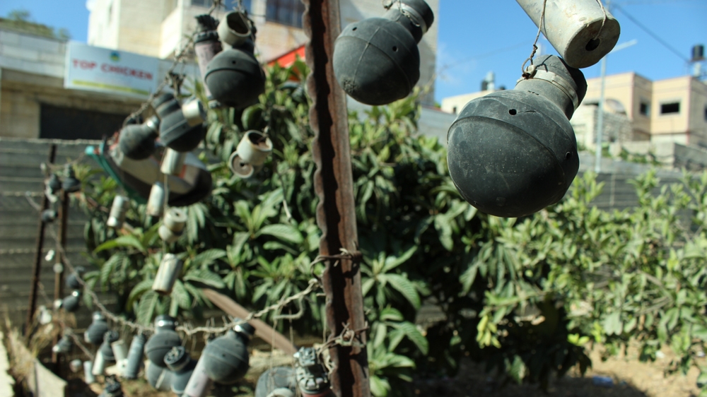 Tear gas canisters collected by residents of Nabi Saleh village [Jaclynn Ashly/Al Jazeera]