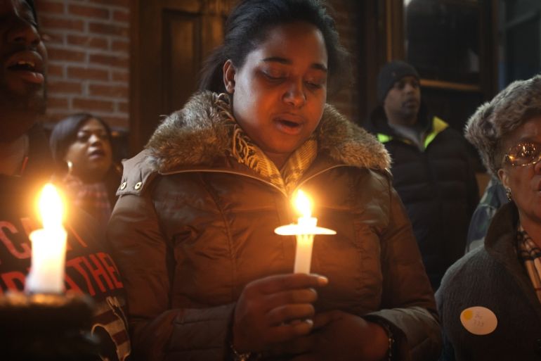 Eric Garner''s daughter Erica takes part in candlelight vigil at the site where her father died in July last year after being put in a chokehold, during a Martin Luther King Day service in New York