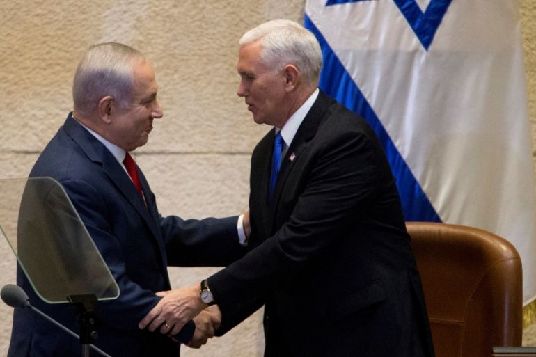 U.S. Vice President Mike Pence shakes hands with Israeli Prime Minister Benjamin Netanyahu ahead of his address to the Knesset, Israeli Parliament, in Jerusalem