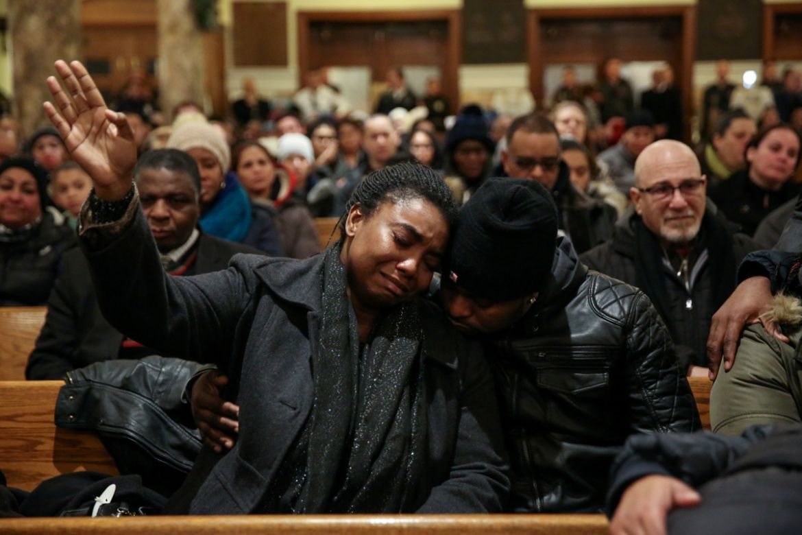 Family members of the victims of an apartment fire in Bronx that took place on December 28, 2017 mourn their relatives in Bronx, New York, U.S., January 2, 2018. REUTERS/Amr Alfiky TPX IMAGES OF THE D