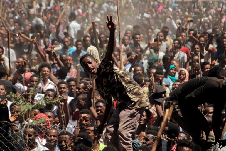 Supporters of Bekele Gerba, secretary general of the Oromo Federalist Congress (OFC), chant slogans to celebrate Gerba''s release from prison, in Adama, Oromia Region, Ethiopia