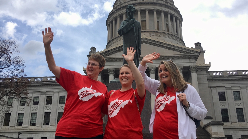 Thousands of teachers showed up in Charleston, West Virginia to protest against low pay and lack of benefits [ John Raby/ AP Photo]