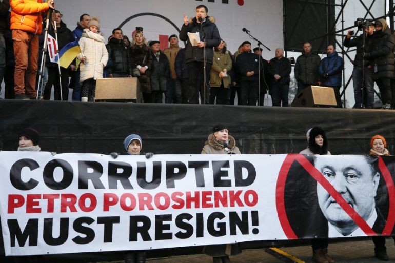 Ukrainian opposition figure Saakashvili addresses his supporters during a rally in Kiev