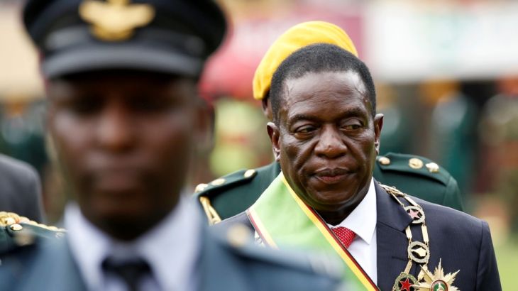 Emmerson Mnangagwa walks after he was sworn in as Zimbabwe''s president in Harare