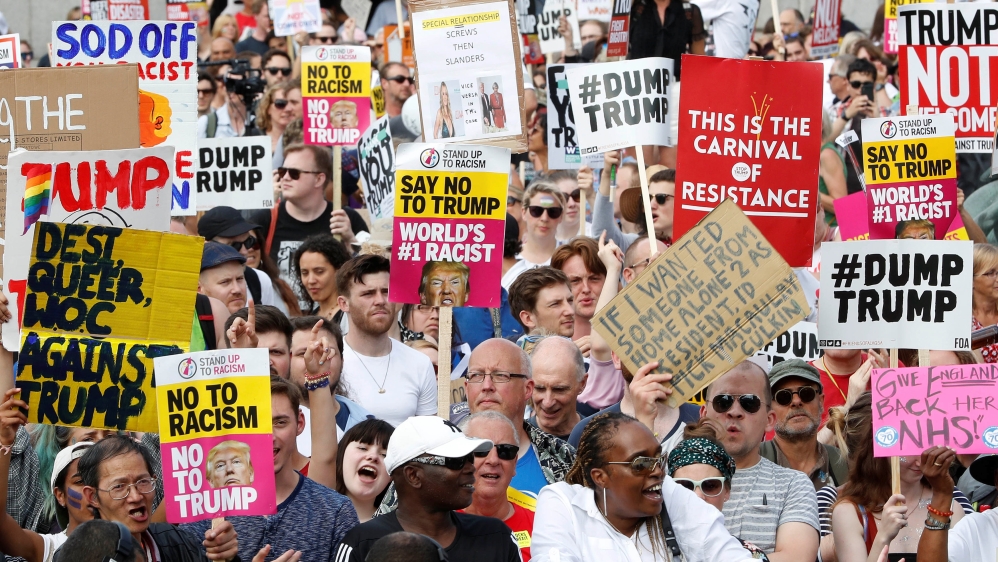 Demonstrators protest against Trump's visit in central London [Yves Herman/Reuters]