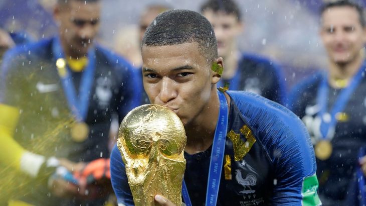 France''s Kylian Mbappe kisses the trophy after the final match between France and Croatia at the 2018 soccer World Cup in the Luzhniki Stadium in Moscow, Russia, Sunday, July 15, 2018. France won the