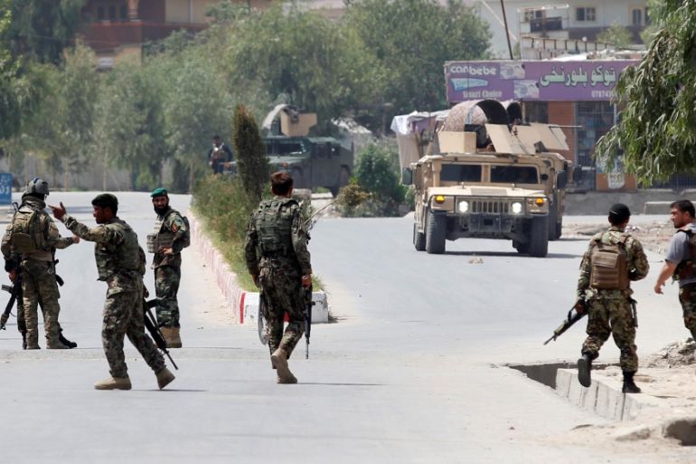Afghan National Army (ANA) soldiers arrive at the site of gunfire and attack in Jalalabad city