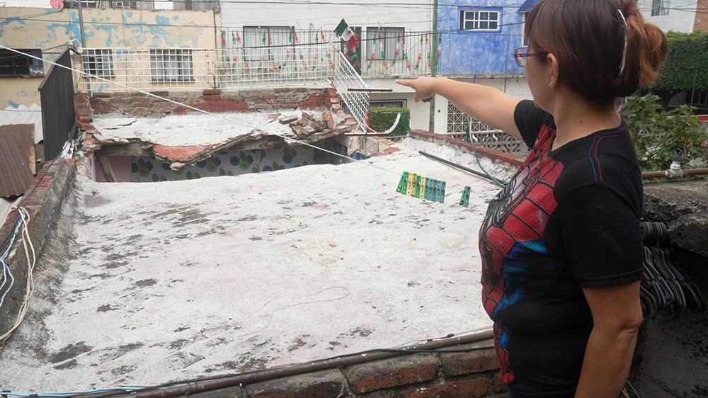 The roof of Resendiz's granddaughters' bedroom caved in during last September's earthquake [Lucina Melesio Friedman/Al Jazeera]
