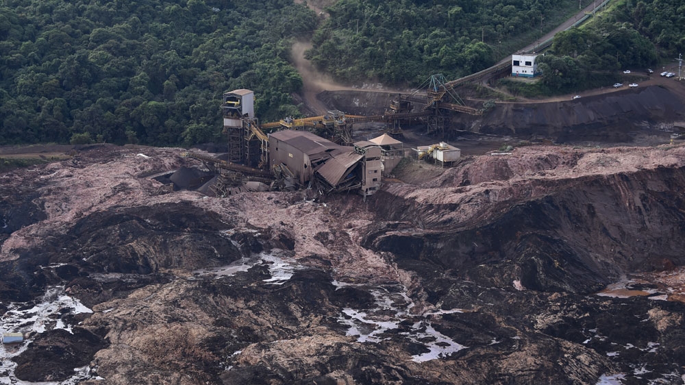 A dam at the same mining site burst on Friday [Douglas Magno/AFP]