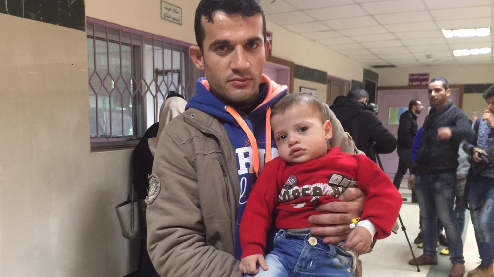 Sufian Salem frequently rushes his son, Mohammed to hospital due to breathing problems [Maram Humaid/Al Jazeera]