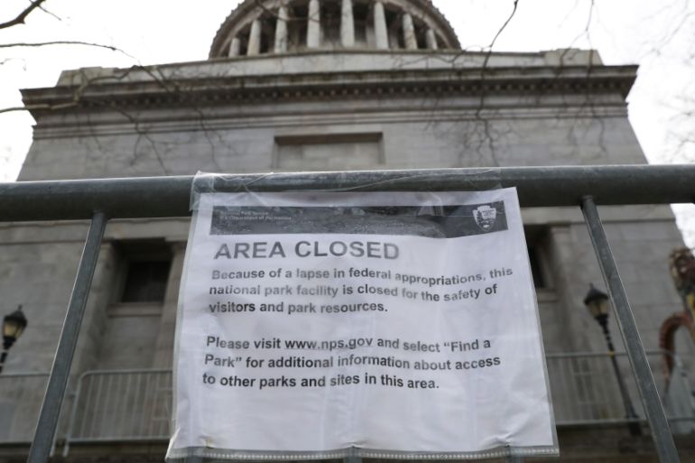 A sign says the General Grant National Monument is closed due to the partial government shutdown in New York City