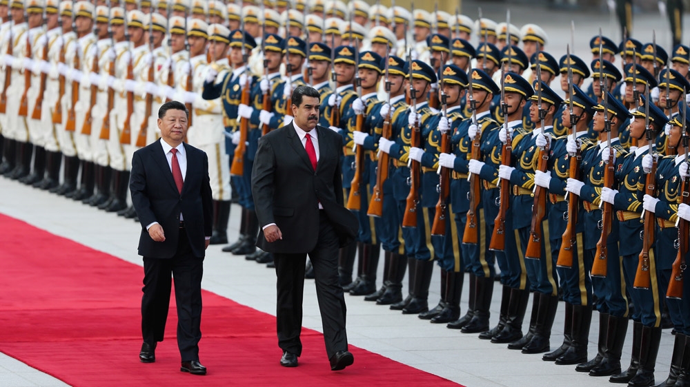 Maduro has been strengthening ties with China, Russia and others [File: Miraflores Palace Handout via Reuters]