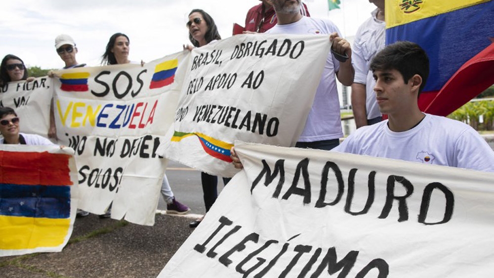 Venezuelans living in Brazil and other countries are protesting Maduro's inauguration [Sergio Lima/AFP]
