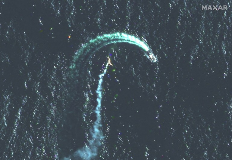 A satellite image shows a Serna-class landing craft and possible missile contrail near Snake Island.
