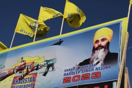 A mural features the image of late Canadian Sikh leader Hardeep Singh Nijjar, who was killed on the grounds of the Guru Nanak Sikh Gurdwara temple in British Columbia in June 2023 [File: Chris Helgren/Reuters]