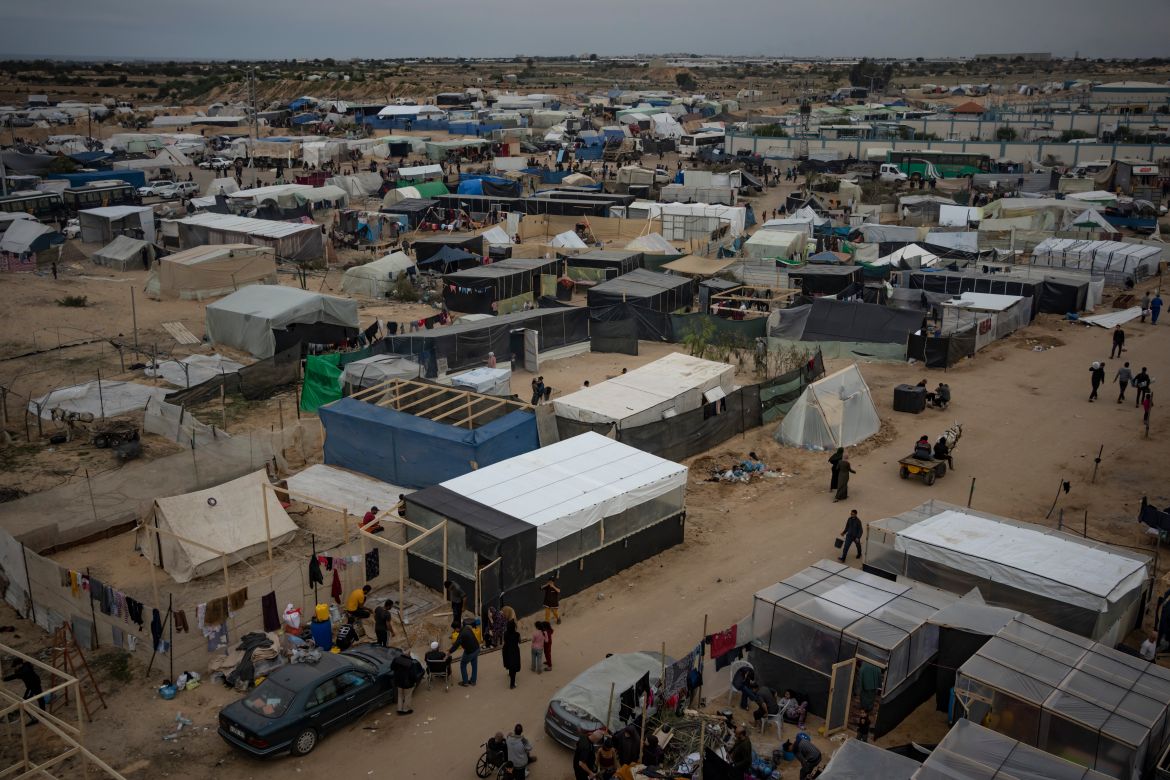 Palestinians displaced by the Israeli ground offensive on the Gaza Strip set up a tent camp in the Muwasi area.