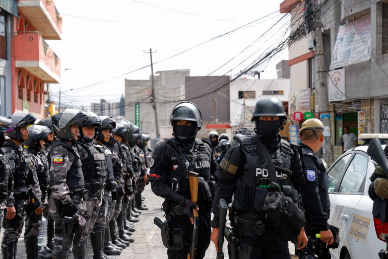 Police leave the El Inca prison after a security operation due to riots, following the disappearance of Jose Adolfo Macias, alias 'Fito', leader of the Los Choneros criminal group