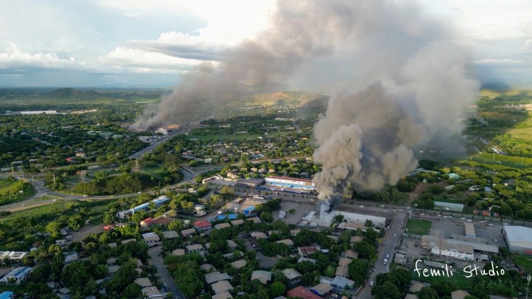An aerial view of the unrest in Port Moresby. Smoke is billowing from burning buildings