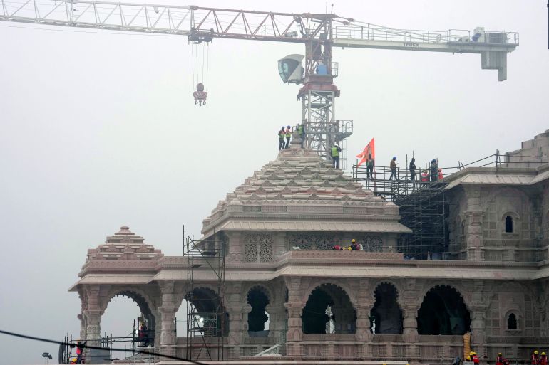 A construction crew works on Ram Mandir, a Hindu temple dedicated to Lord Ram, being built at the site of the demolished Babri Masjid in Ayodhya, India, December 29, 2023
