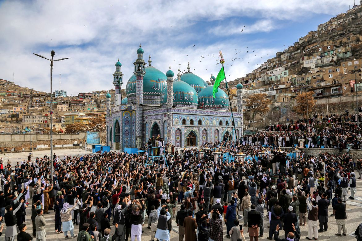 Afghans gather around the Shrine of Saint Sakhi Saib
