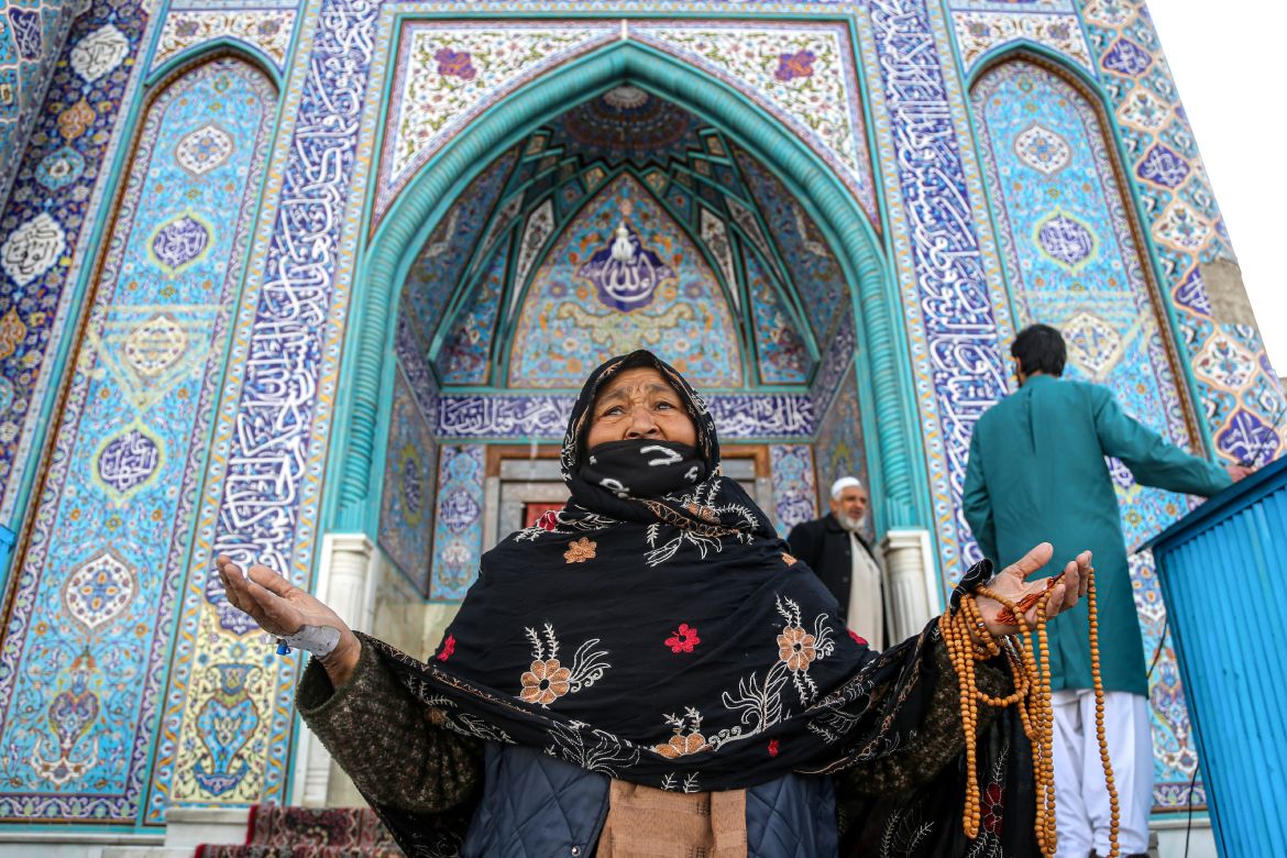 An Afghan woman visits the Shrine of Saint Sakhi Saib