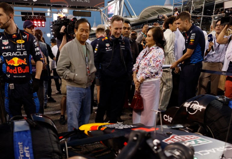 Formula One F1 - Bahrain Grand Prix - Bahrain International Circuit, Sakhir, Bahrain - March 2, 2024 Red Bull team principal Christian Horner and Businessman Chalerm Yoovidhya with his wife Daranee Yoovidhya are seen after the race REUTERS/Hamad I Mohammed