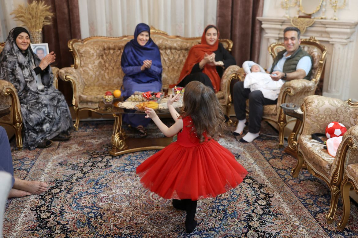 An Iranian family attends a party on the Iranian New Year or Nowruz