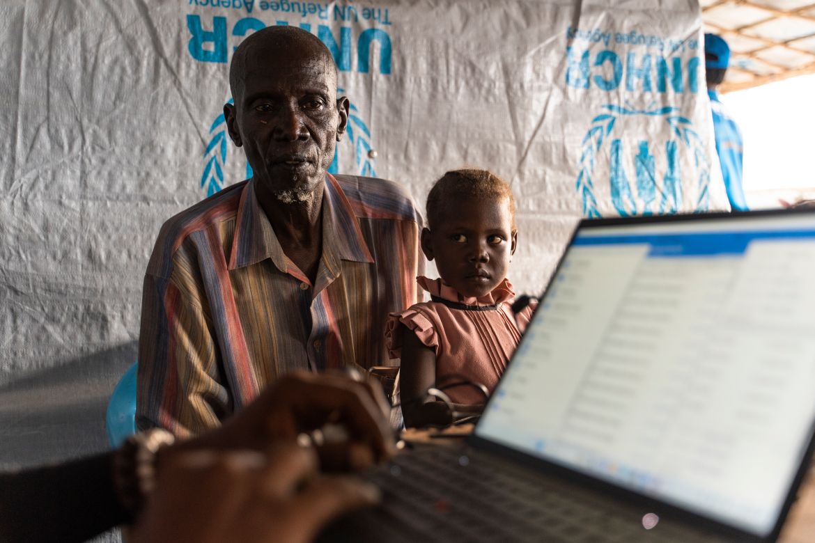 In November 2023, Alfadi Faiz and his niece at the UNHCR registration point in Renk, South Sudan