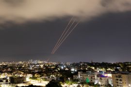 An anti-missile system operates after Iran launched drones and missiles towards Israel, as seen from Ashkelon, Israel April 14, 2024